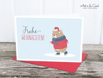 Carte pliée: ours de patinage sur glace