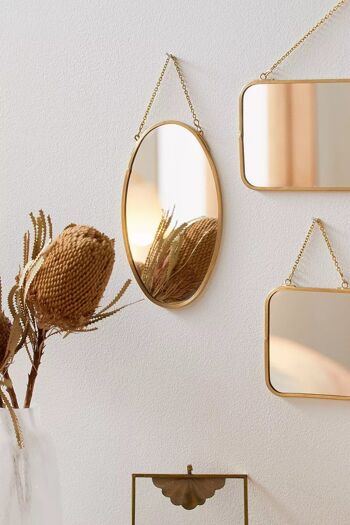Miroir ovale suspendu doré 3