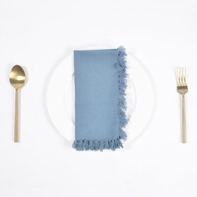Lot de 4 serviettes de table bleu sarcelle avec bordures à franges.