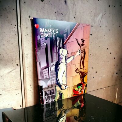 Cuadro A5 de Banksy Comics - Los graffitis son un crimen