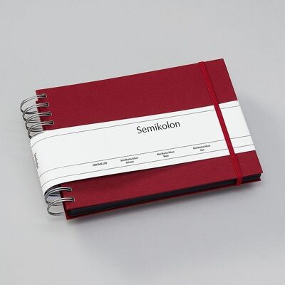 Mini Mucho album, black cardboard, burgundy