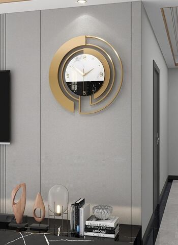Horloge murale en métal doré avec cadran en verre noir et blanc. Dimension : 45 cmDF-140 2