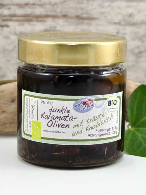Schwarze Bio Oliven mit Stein mit Kräutern und Knoblauch in Olivenöl - Griechenland Kalamata