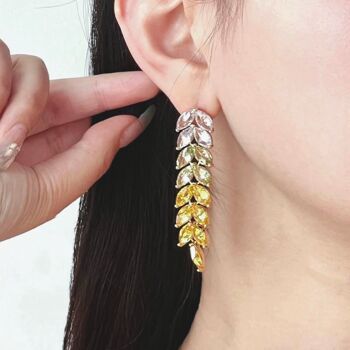 Boucles d'oreilles pendantes longues avec feuilles de zircone jaune éclatantes : le summum du luxe 5