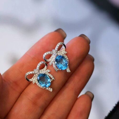 Sterling silver princess style stunning nature vivid blue topaz earrings - large pear cut topaz