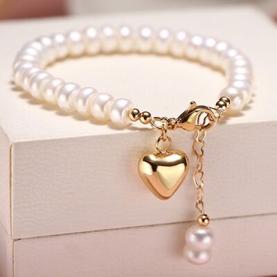 Bracelet fait main en perles d'eau douce au design intemporel