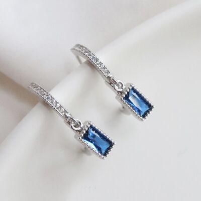 Sterling silver sparkling hoop earring with square sapphire-look stone
