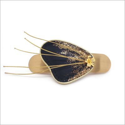 Black and gold leather hair accessory