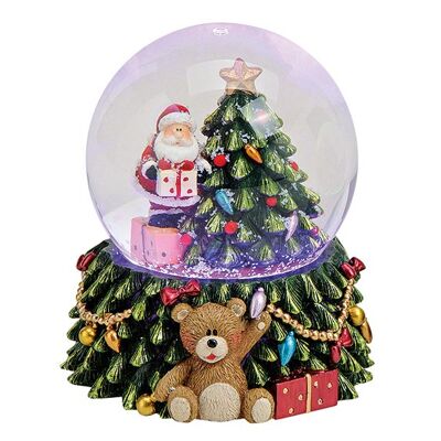 Globo de nieve de Santa Claus en árbol con iluminación