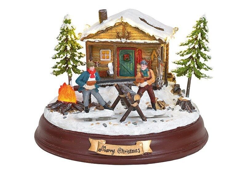 Winter scene of loggers with lights