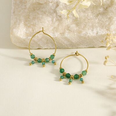 Creole earrings with green stones