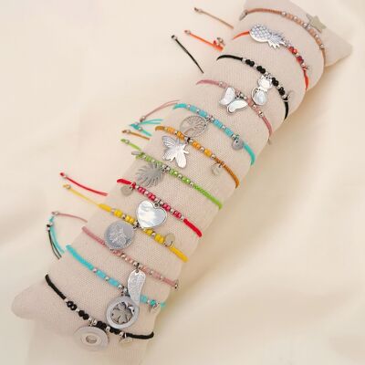 Set of thread bracelets with silver pendants