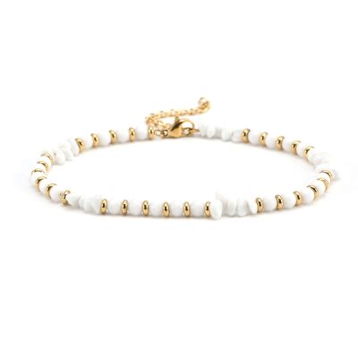 Gold anklet and white stone