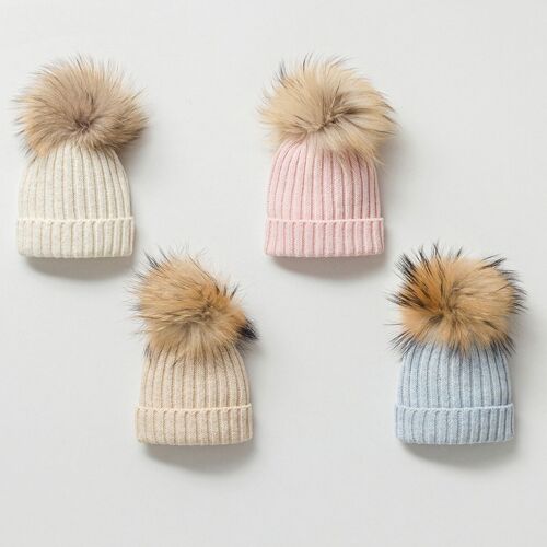 A Pack of Four Unisex Organic Cotton Knitted Pom Pom Hats