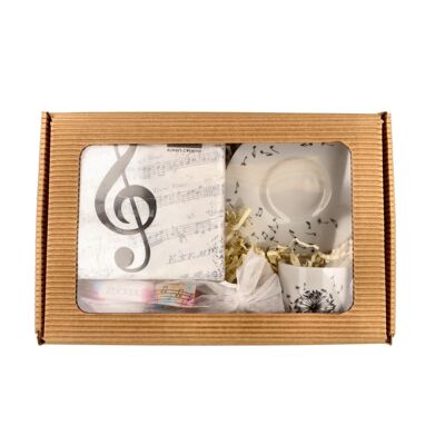 Gift set with espresso place setting, napkins and 4 sugar sticks in a folding box with a viewing window