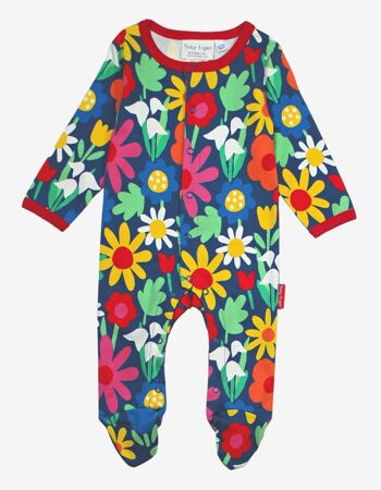 Pyjama une pièce en coton biologique avec un motif floral saisissant