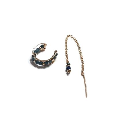 Set of golden asymmetrical earrings with Sapphire