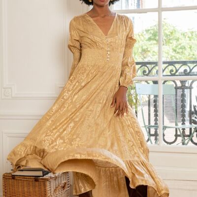 Long loose cut dress with gold effect print.