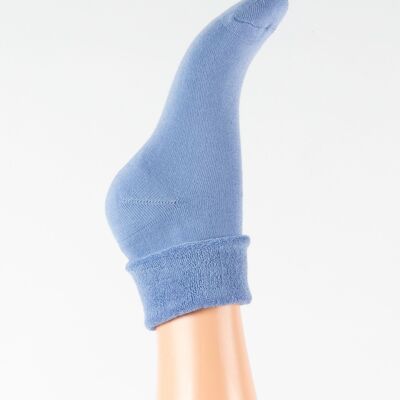 Women's sock with laser cut cuff and turn-up