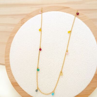 Gold chain necklace with dangling colored stones
