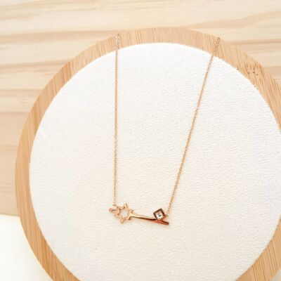 Golden chain necklace with shooting star