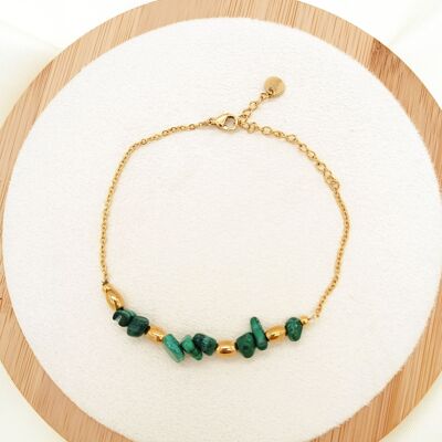 Golden chain bracelet with green stones