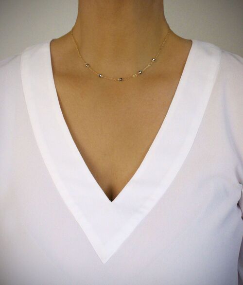 Short gold necklace with Black Diamond crystals