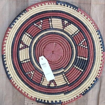 African wall basket in dyed straw for wall decoration