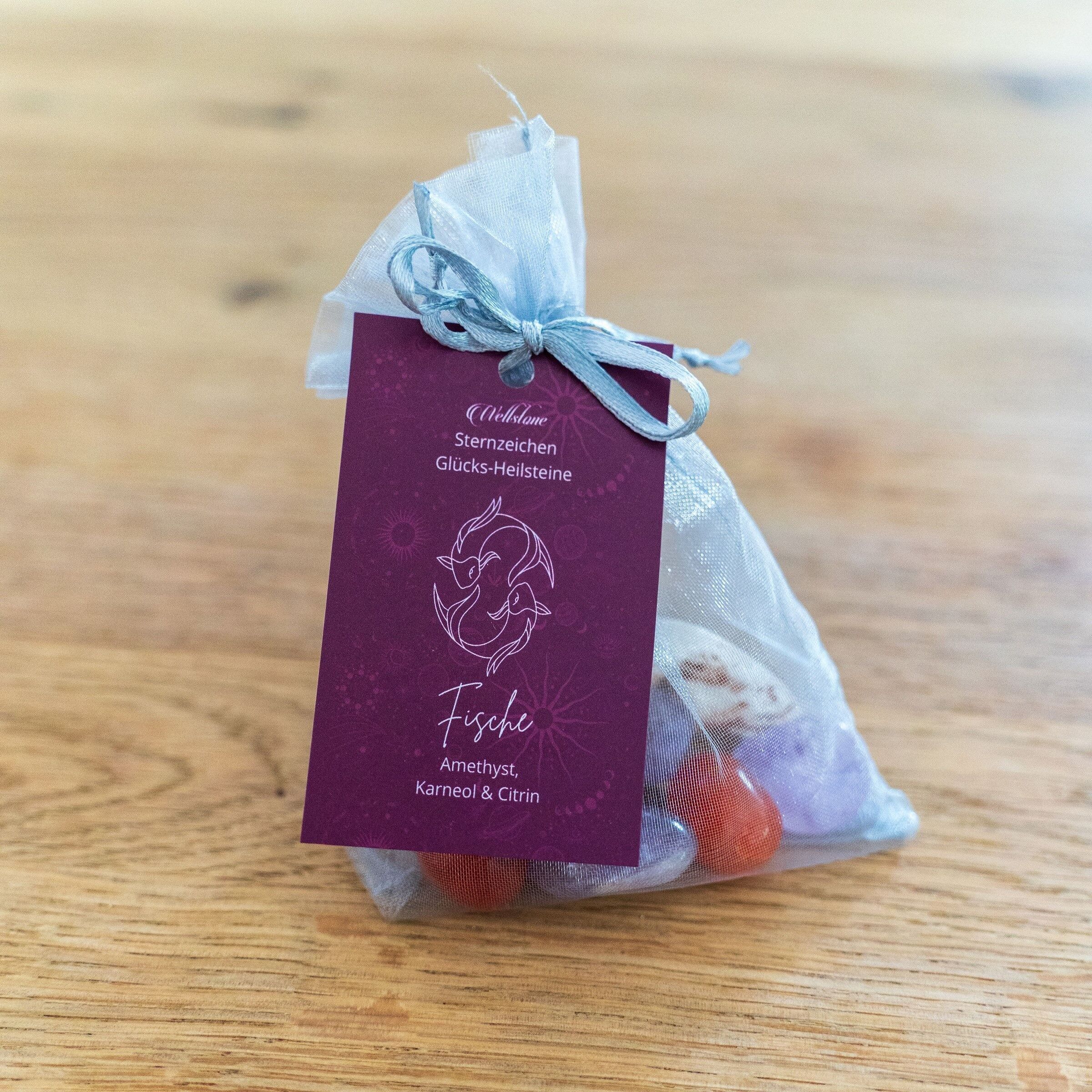Signe du zodiaque Poissons pierres porte-bonheur pierres de guérison avec améthyste, cornaline et citrine