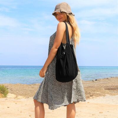 Beach bag in black double fabric embossed on the outside