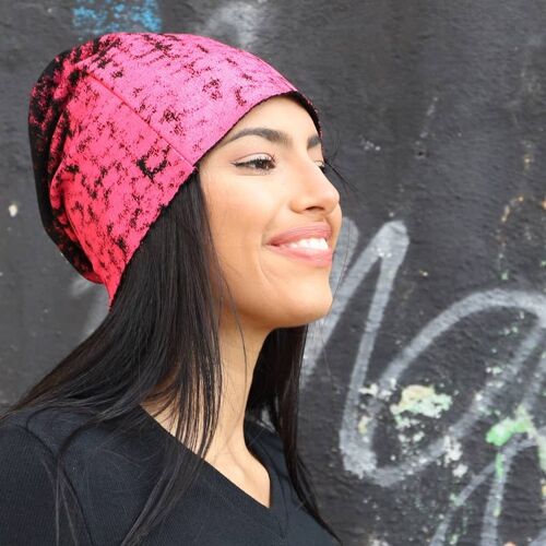 Black beanie hat with pink stylized screen printing