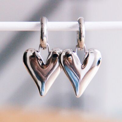 Stainless steel wide hoop earring with XL closed heart - silver