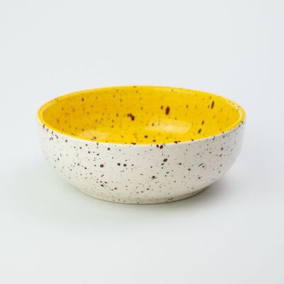 Ceramic plate for grating vegetables, nuts, fruit. White and yellow speckled cinnamon