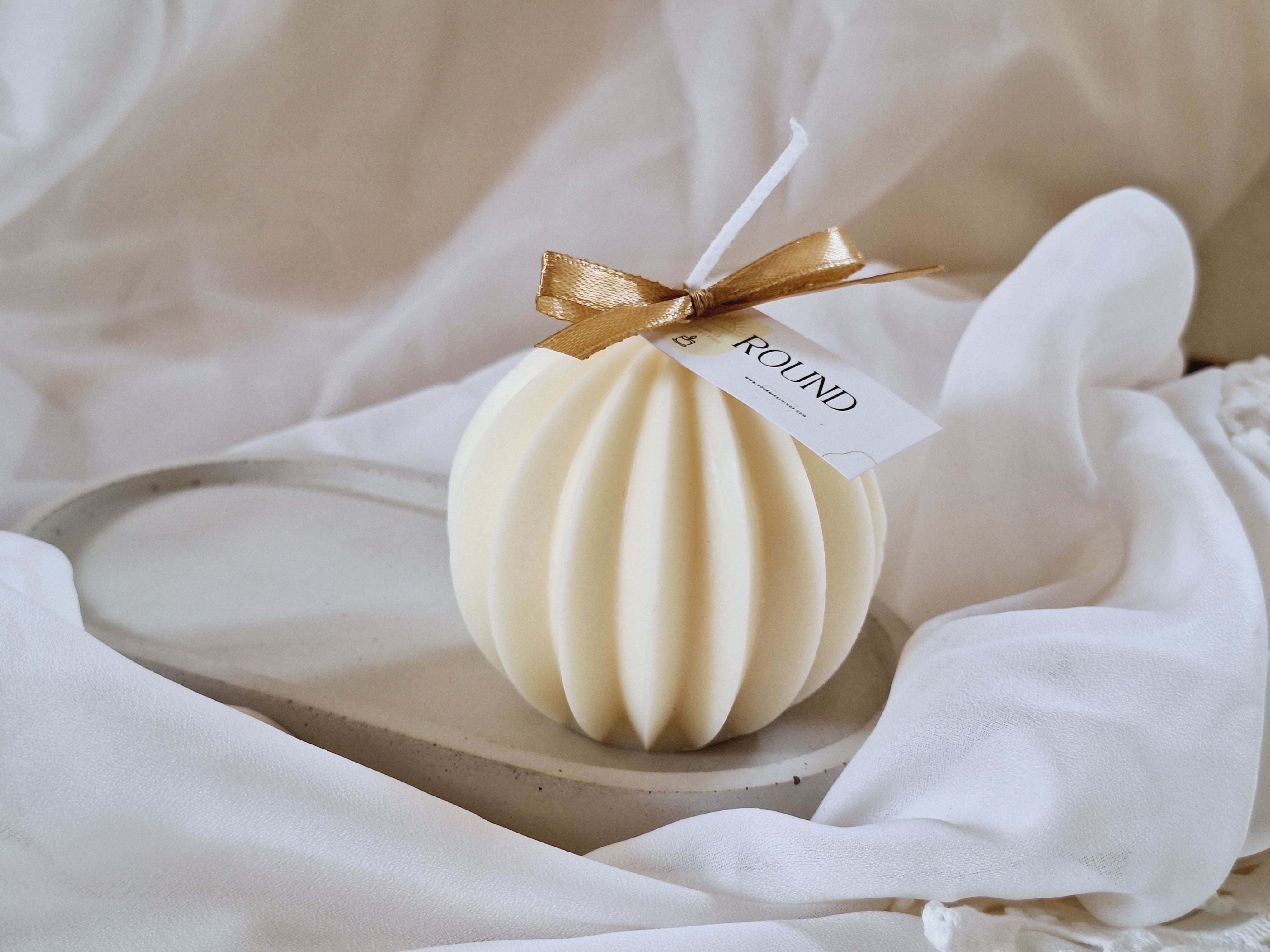 Vela decorativa de cera de soja round naranja dulce y salvia