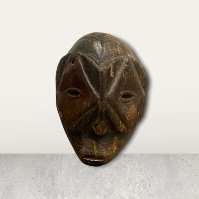 Small African mask on stand