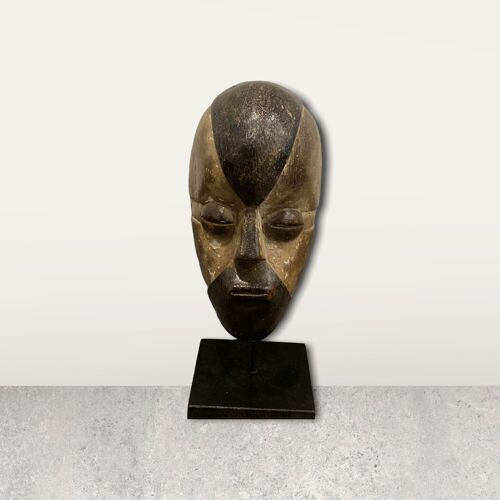 Small African mask on stand