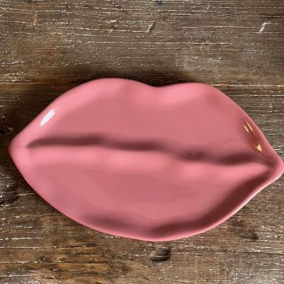 Sisi-Teller, Lippenschlag