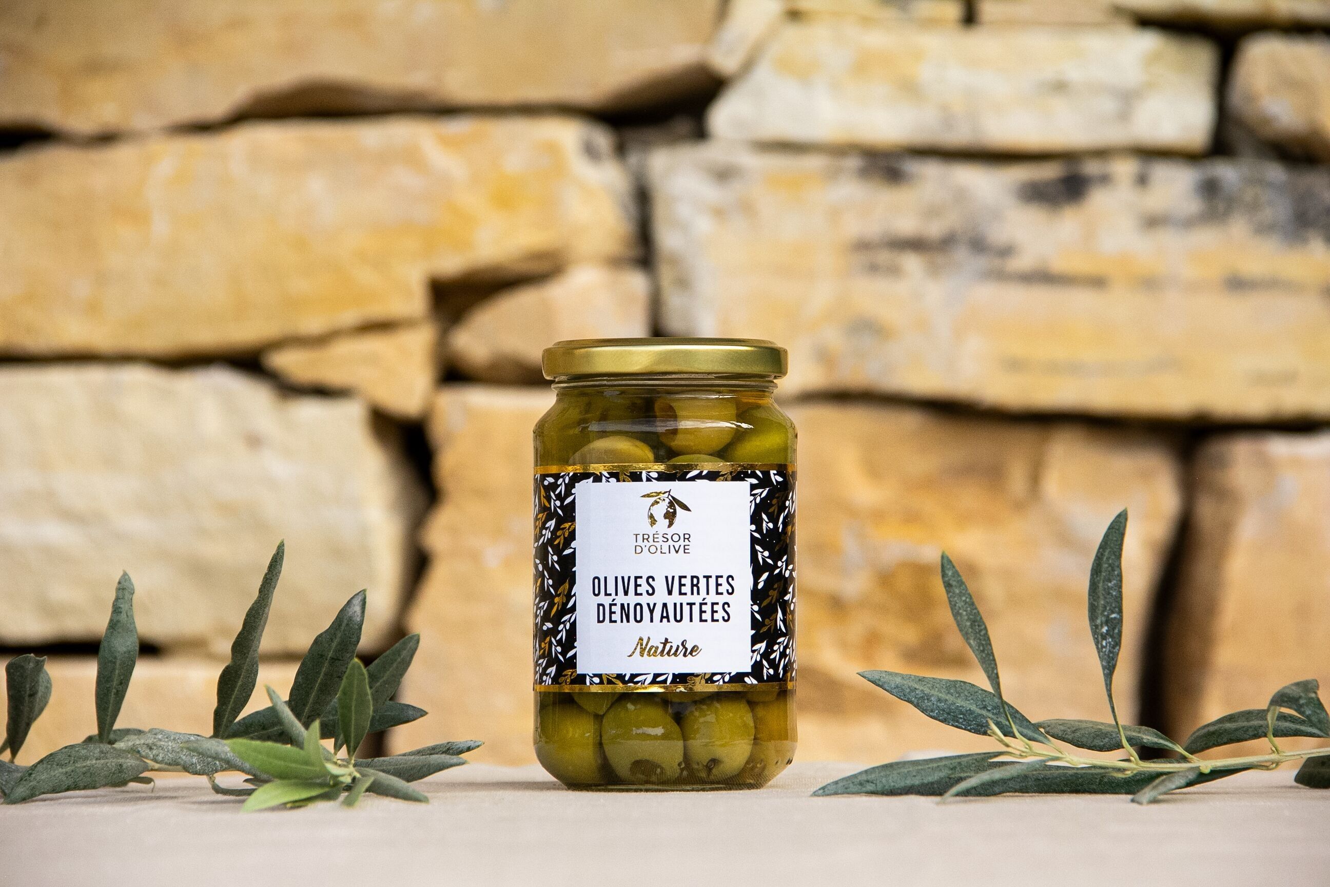 Einfache entsteinte grüne Oliven