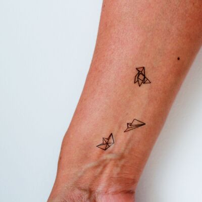 temporary tattoo origami plane, casserole dish and paper boat