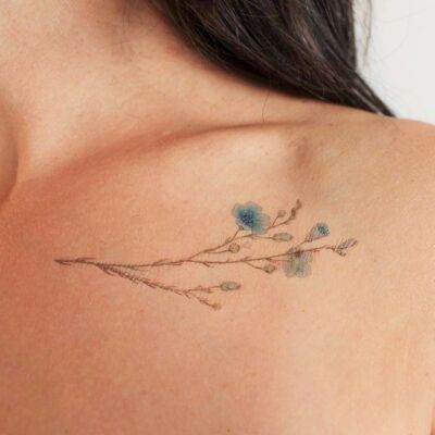 Tatuaje temporal de flor azul salvaje