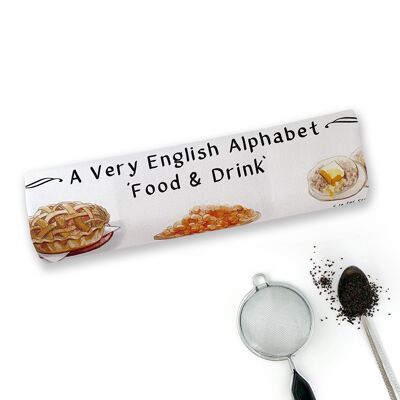 Uno strofinaccio con scritta "Food & Drink" con alfabeto molto inglese
