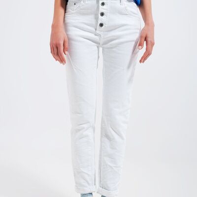 Exposed buttons skinny jeans in white