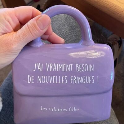 Gift idea: Purple handbag piggy bank “I really need new clothes”
