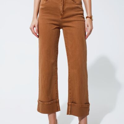 Straight leg jeans in camel with folded trouser legs