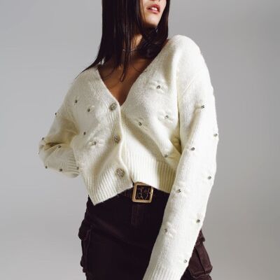 Cream cardigan with knitted flowers and embellished details