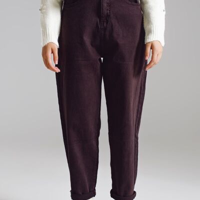 Brown relaxed pants with pocket detail at the waist