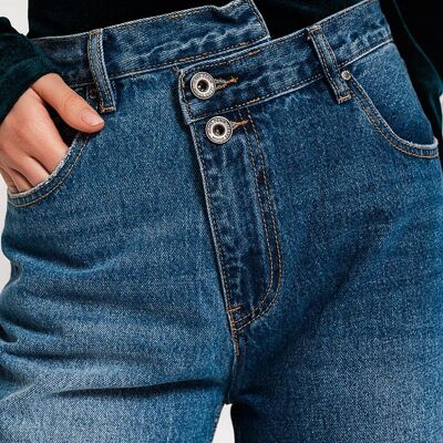 Asymmetric button detail straight jeans in mid blue