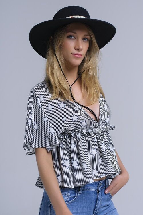 Black top with stars and ruffle