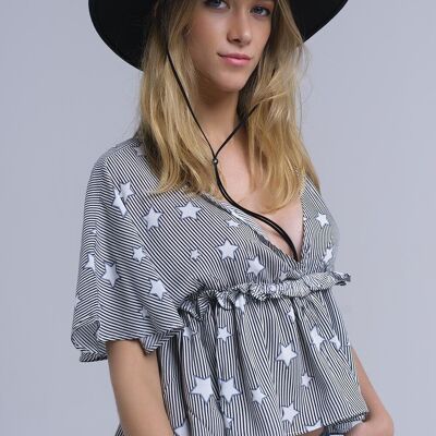 Black top with stars and ruffle