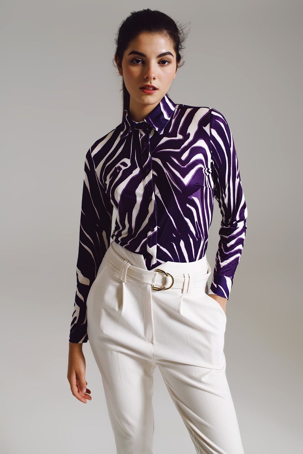 Blusa con stampa zebrata in viola e panna